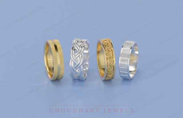 Four men's wedding bands on a blue background: a yellow gold band with a center groove, a white gold braided band, a yellow gold engraved band and a white gold textured band.